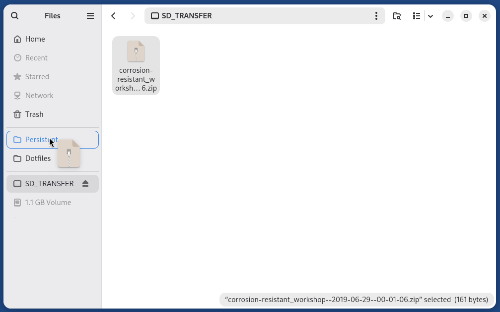 Files application displaying the content of the Transfer Device. A file is being dragged over a shortcut named 'Persistent' in the list of places on the left.